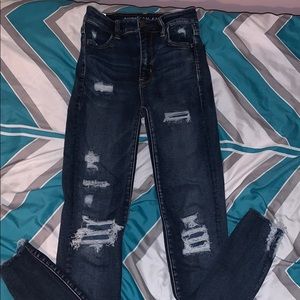 dark wash ripped american eagle jeans